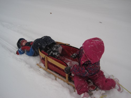 This is a silly way to sled (and tough for the mommy doing the pulling!)