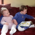 Kids reading on the couch